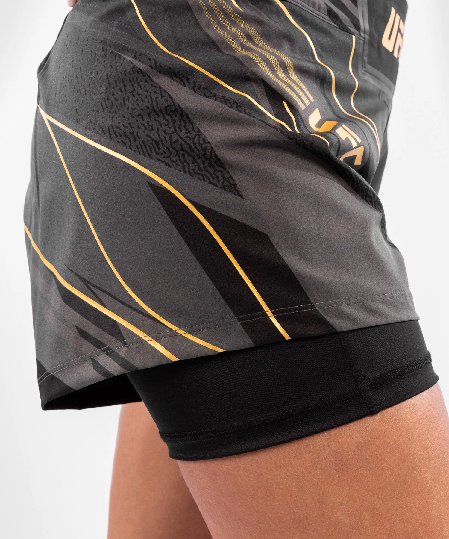 Shorts Venum UFC AFN dama (negro/oro)